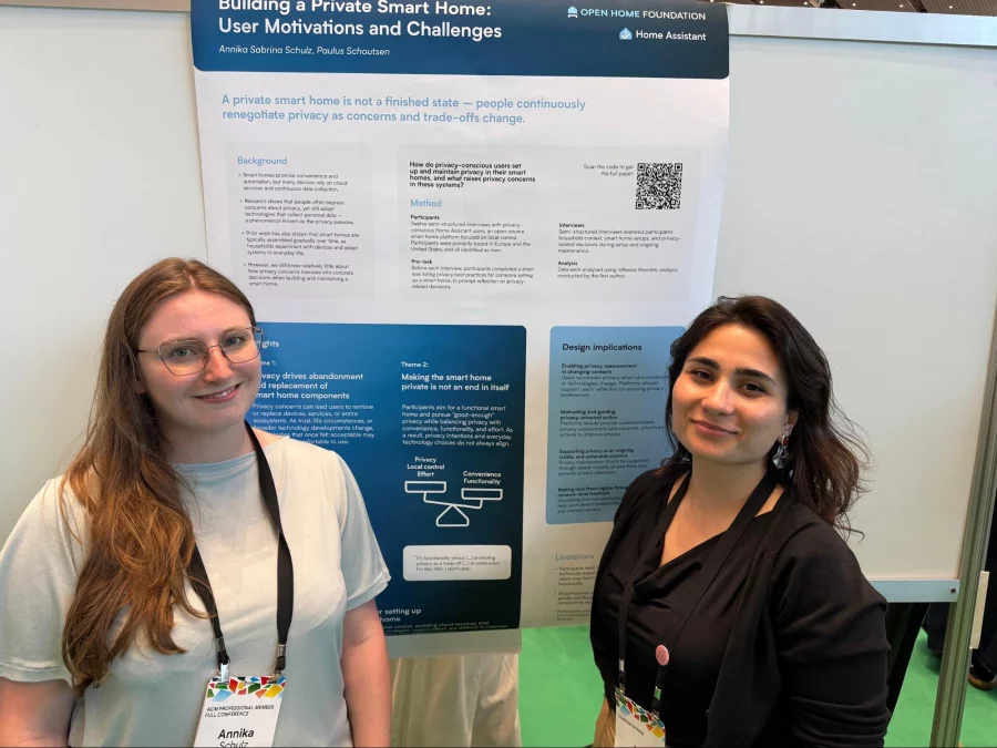 Annika Schulz (left) and Idil Bostan stand in front of a research poster at ACM CHI 2026 in Barcelona. The poster, branded with the Open Home Foundation and Home Assistant logos, is titled "Building a Private Smart Home: User Motivations and Challenges" and lists Annika Schulz and Paulus Schoutsen as authors.